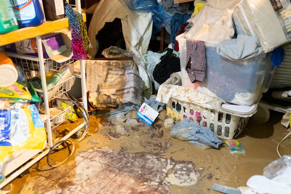 Camille Hammar-Gipple’s belongings sat in a big pile in her basement in St. Louis Park on May 26 after a water main break.