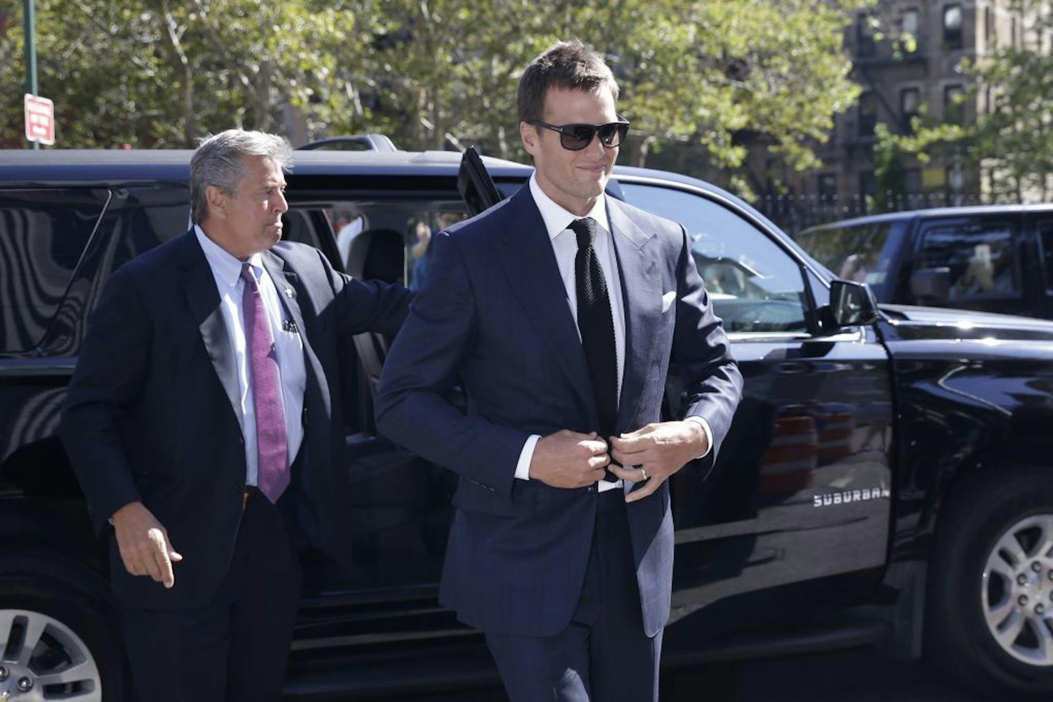 New England Patriots quarterback Tom Brady arrives at federal court, Wednesday, Aug. 12, 2015, in New York. Brady and NFL Commissioner Roger Goodell are set to explain to a judge why a controversy over underinflated footballs at last season's AFC conference championship game is spilling into a new season.