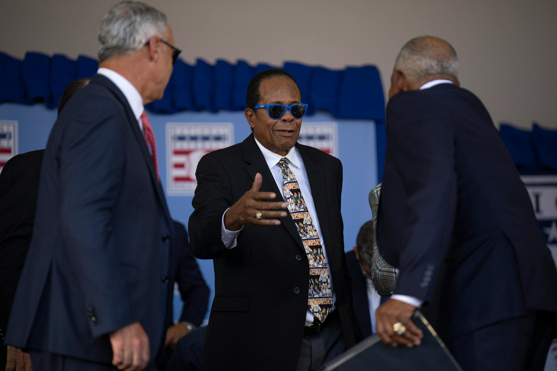 Twins legend Rod Carew reached to hug his former teammate and road roommate, Tony Oliva, after he delivered his acceptance speech during the Hall of Fame Induction Ceremony Sunday, July 24, 2022 on the grounds of the Clark Sports Center in Cooperstown, New York. ] JEFF WHEELER • Jeff.Wheeler@startribune.com