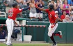 Twins center fielder Byron Buxton was congratulated by third base coach Tony Diaz after hitting a two-run home run. Buxton is in line for a reboot thi