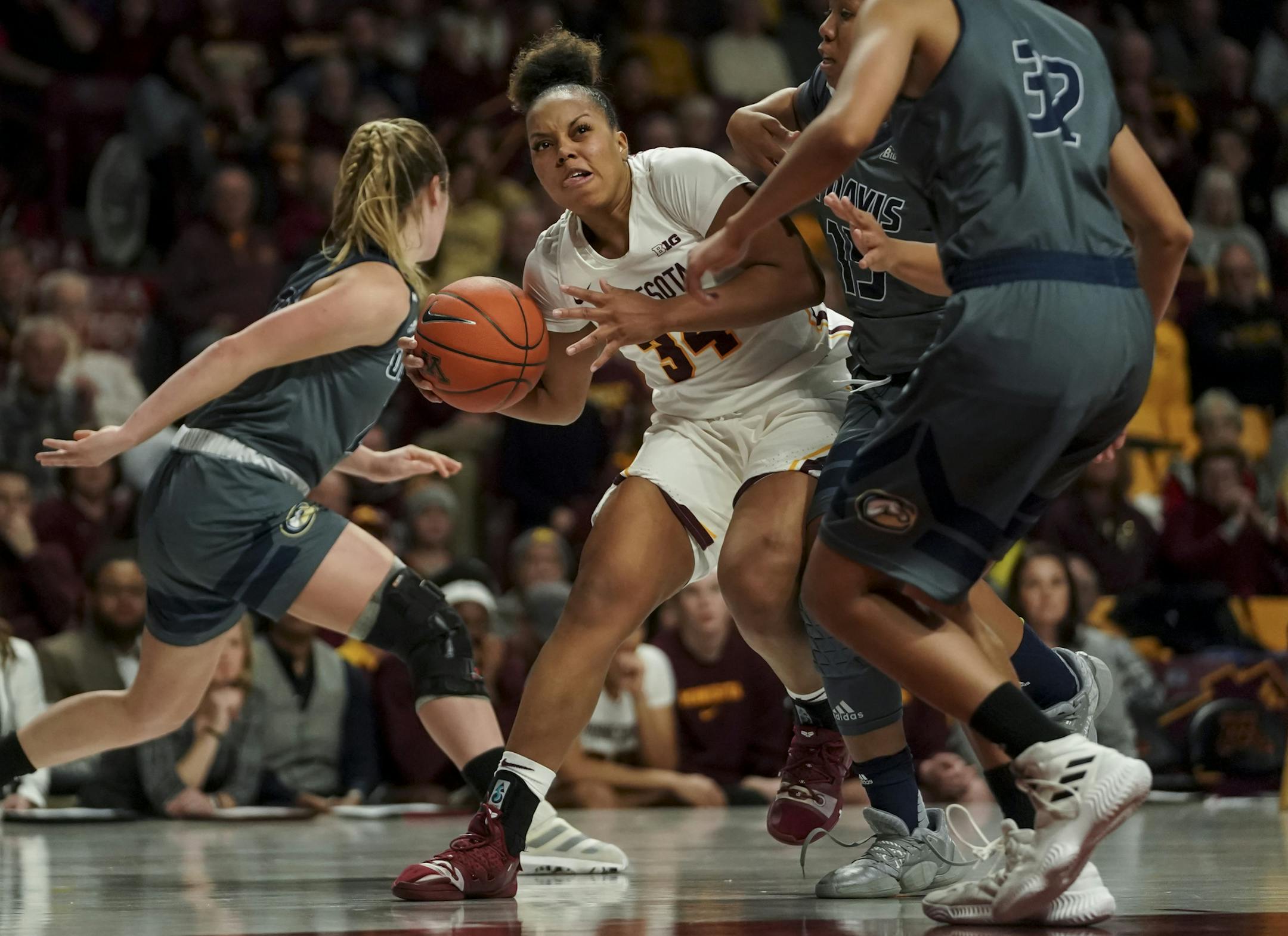 Minnesota Golden Gophers guard Gadiva Hubbard (34) pushed through UC Davis players in the second half. ] RENEE JONES SCHNEIDER ¥ renee.jones@startribune.com The Minnesota Gophers women's basketball hosted the UC Davis Aggies at Williams arena on Sunday, December 15, 2019.