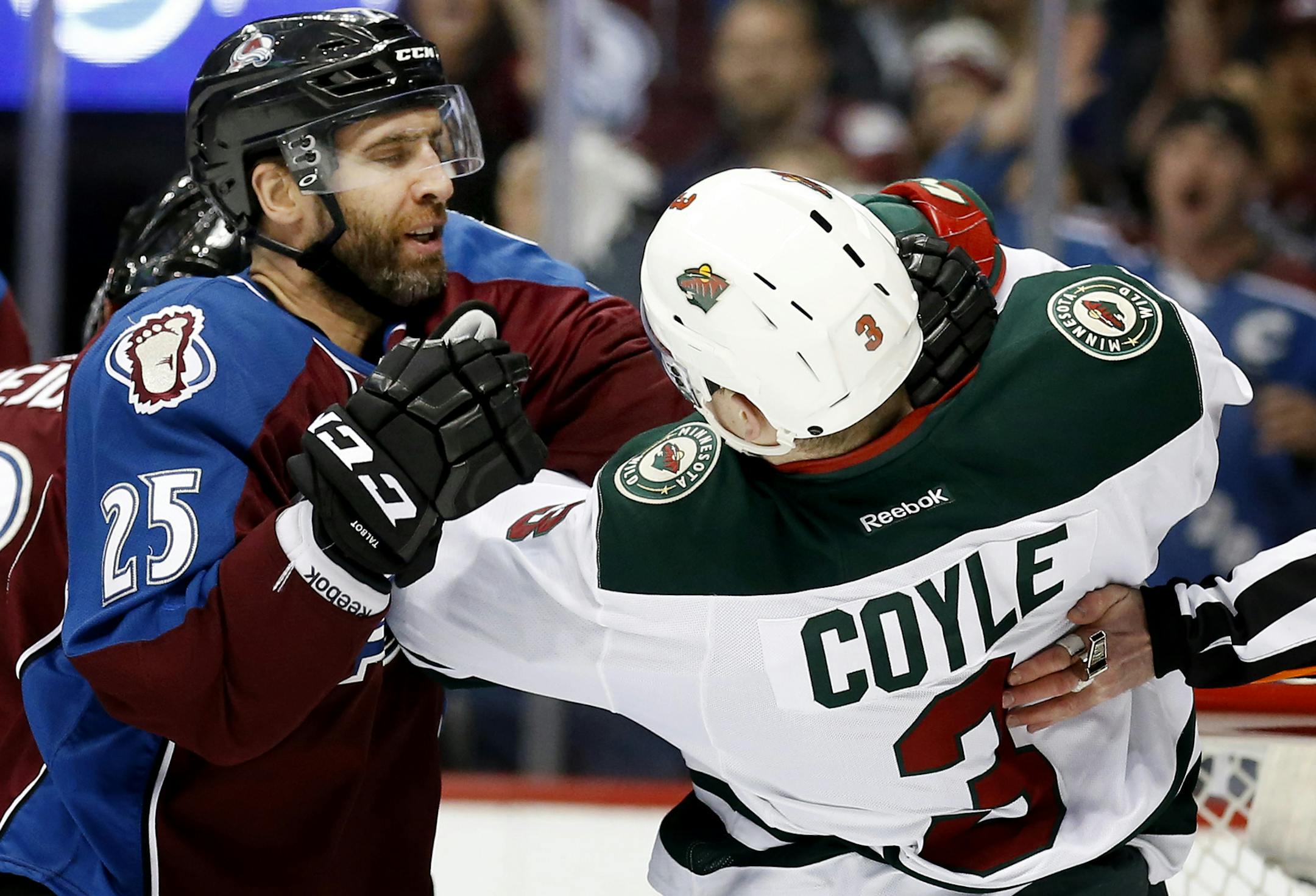 Charlie Coyle (3) and Maxime Talbot (25) pushed each other in front of the goal in the first period. ] CARLOS GONZALEZ cgonzalez@startribune.com - April 19, 2014, Denver, Colorado, Pepsi Center, NHL, Minnesota Wild vs. Colorado Avalanche, Stanley Cup Playoffs round 1, Game 2