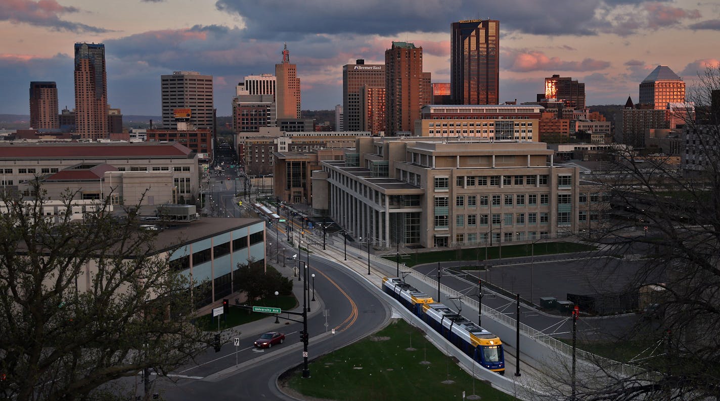 One of many test trains being operated for training purposes left downtown St. Paul along the new Green Line, headed toward Minneapolis and the setting sun. ] JIM GEHRZ &#x201a;&#xc4;&#xa2; jgehrz@startribune.com / Minneapolis, MN / May 13 , 2014 / 8:30 PM / BACKGROUND INFORMATION: The newly constructed Metro Transit Green Line is the largest public works project in state history. The line, which begins operation for the public on June 14, connects downtown St. Paul and downtown Minneapolis alon