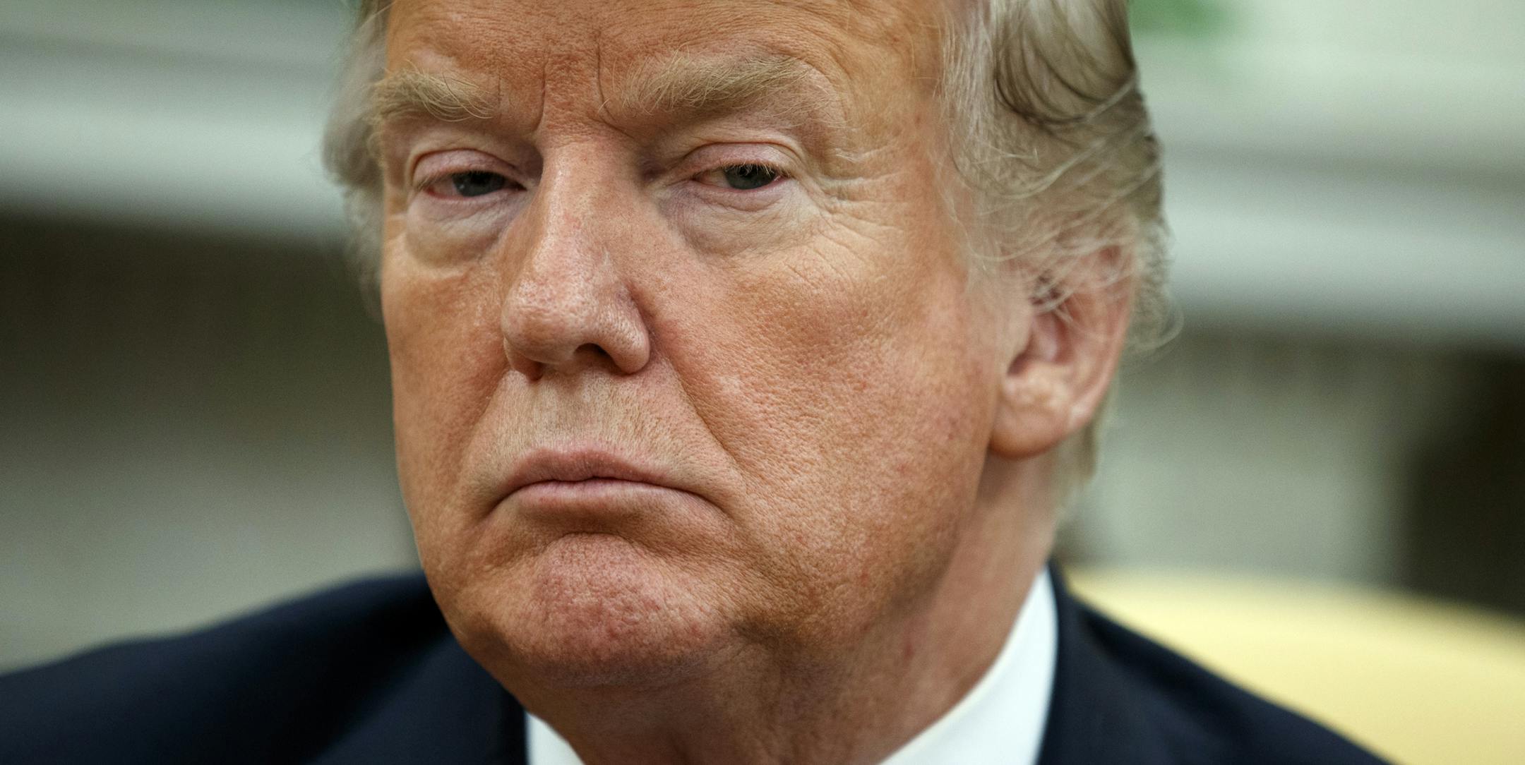 President Donald Trump listens during a meeting with Emir of Kuwait Sheikh Sabah Al Ahmad Al Sabah in the Oval Office of the White House, Wednesday, Sept. 5, 2018, in Washington. (AP Photo/Evan Vucci)