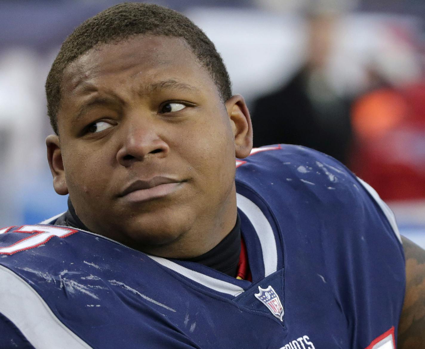 New England Patriots tackle Trent Brown sits on the sideline during the second half of an NFL football game against the Buffalo Bills, Sunday, Dec. 23, 2018, in Foxborough, Mass. (AP Photo/Elise Amendola) ORG XMIT: NYOTK