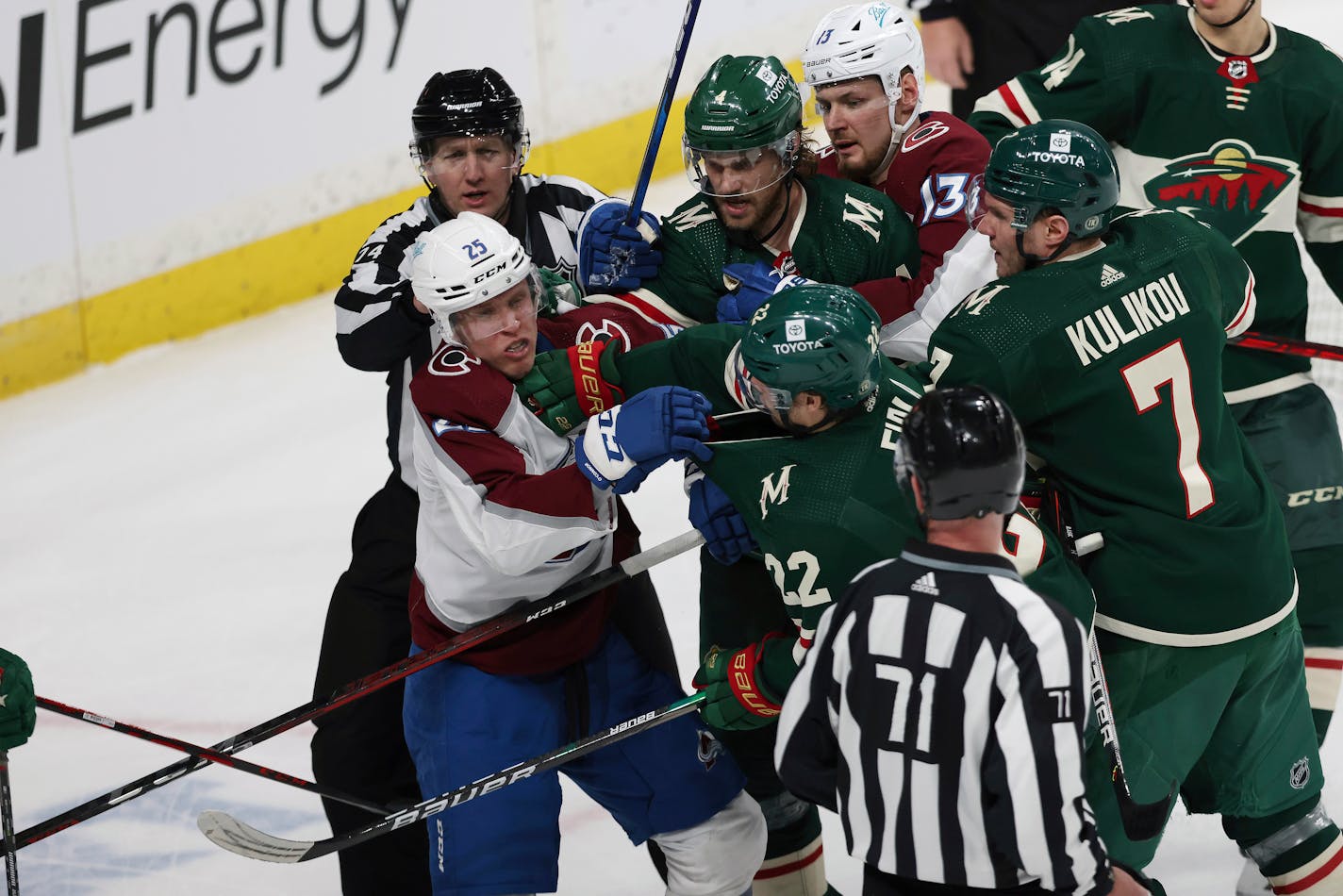 Colorado Avalanche right wing Logan O'Connor (25) and Minnesota Wild left wing Kevin Fiala (22) shove each other during the third period of an NHL hockey game Sunday, March 27, 2022, in St. Paul, Minn. Minnesota won 3-2 in overtime. (AP Photo/Stacy Bengs)