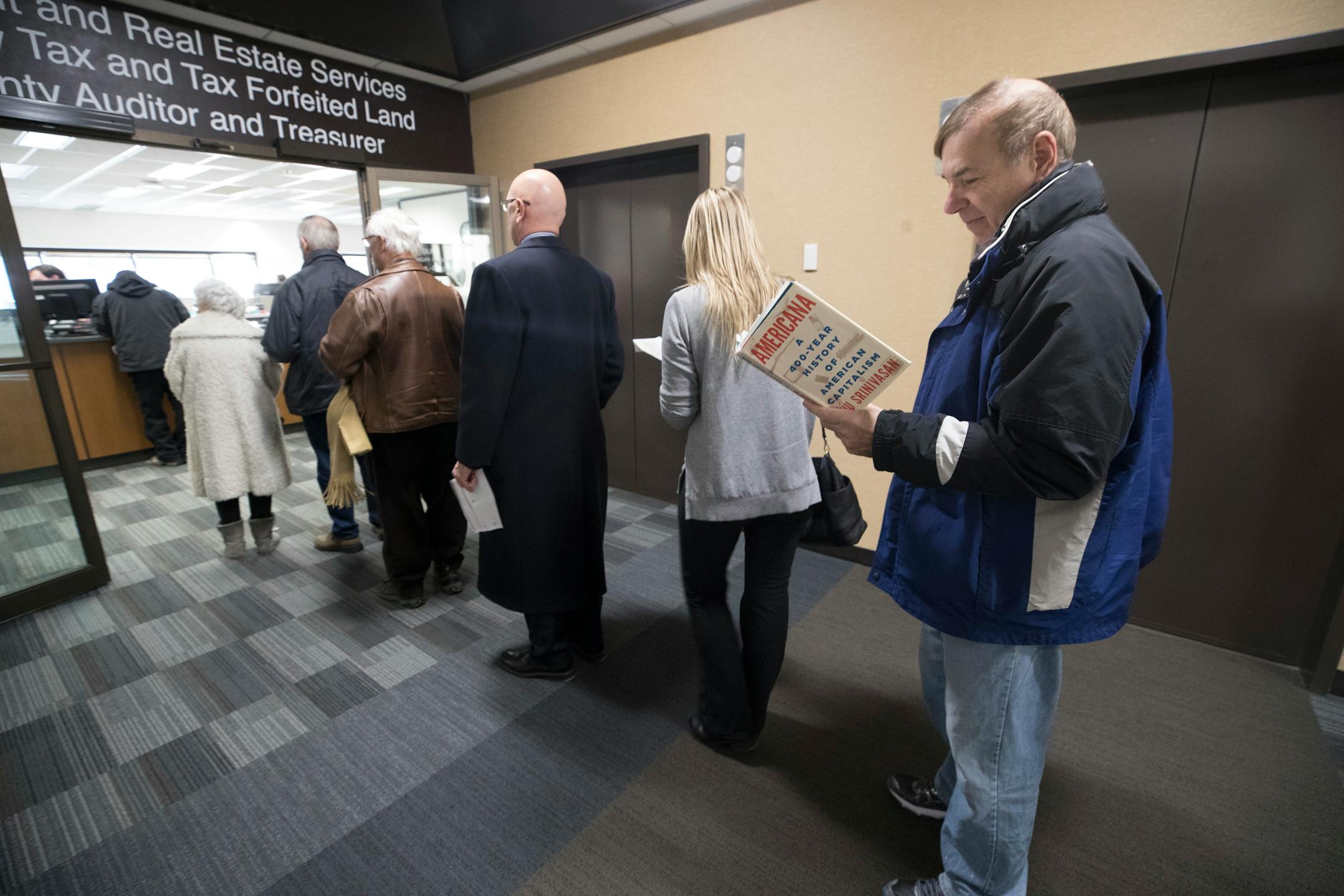 Joe Antonucci waited in line to prepay his 2018 property tax in Minneapolis in 2017.