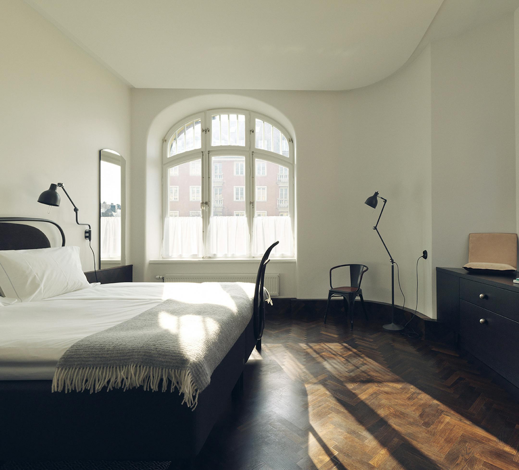 PHOTO MOVED IN ADVANCE AND NOT FOR USE - ONLINE OR IN PRINT - BEFORE FEB. 15, 2015. -- In an undated handout photo, one of 92 guest rooms at Miss Clara, a boutique hotel inside a century-old building once home to a private girls’ school in Stockholm. Stylish and dedicated to beautiful design, Miss Clara’s interiors combine modern artwork with preserved period details like arched windows and a wrought-iron staircase. (Handout via The New York Times) -- NO SALES; FOR EDITORIAL USE ON