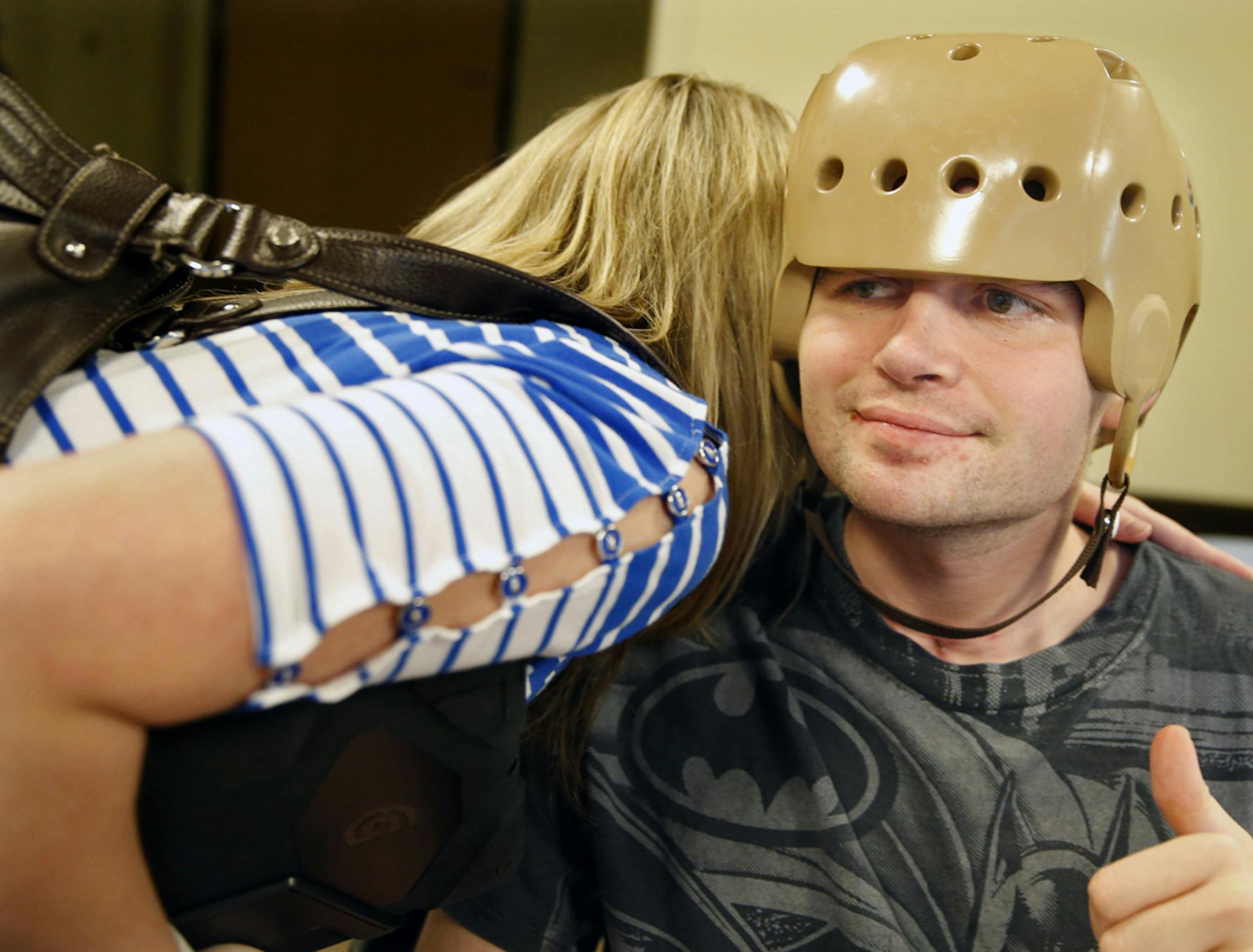 At the Courage Center in Golden Valley, Ray Widstrand is recovering from an attack in August which landed him in intensive care. Part of his cranium was removed to alleviate pressure from swelling. His sister, Alice, visits him almost daily.]richard tsong-taatarii/rtsong-taataarii@startribune.com