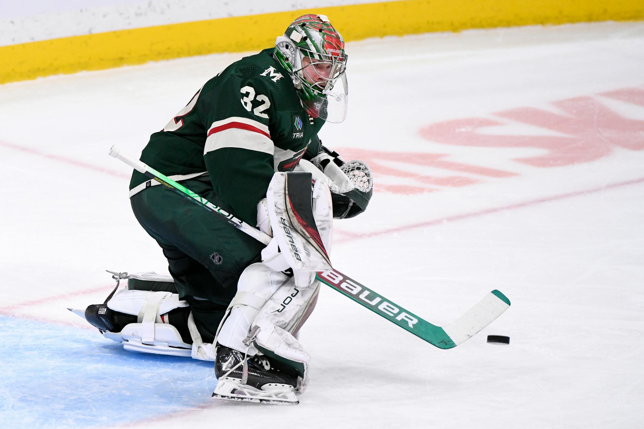 Minnesota Wild goaltender Filip Gustavsson makes a save against the Winnipeg Jets during the third period of an NHL hockey game Tuesday, Dec. 27, 2022, in Winnipeg, Manitoba. (Fred Greenslade/The Canadian Press via AP)