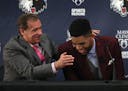June 2015: No. 1 pick Karl-Anthony Towns shares a laugh with the man who chose him: then-head coach Flip Saunders.