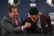June 2015: No. 1 pick Karl-Anthony Towns shares a laugh with the man who chose him: then-head coach Flip Saunders.
