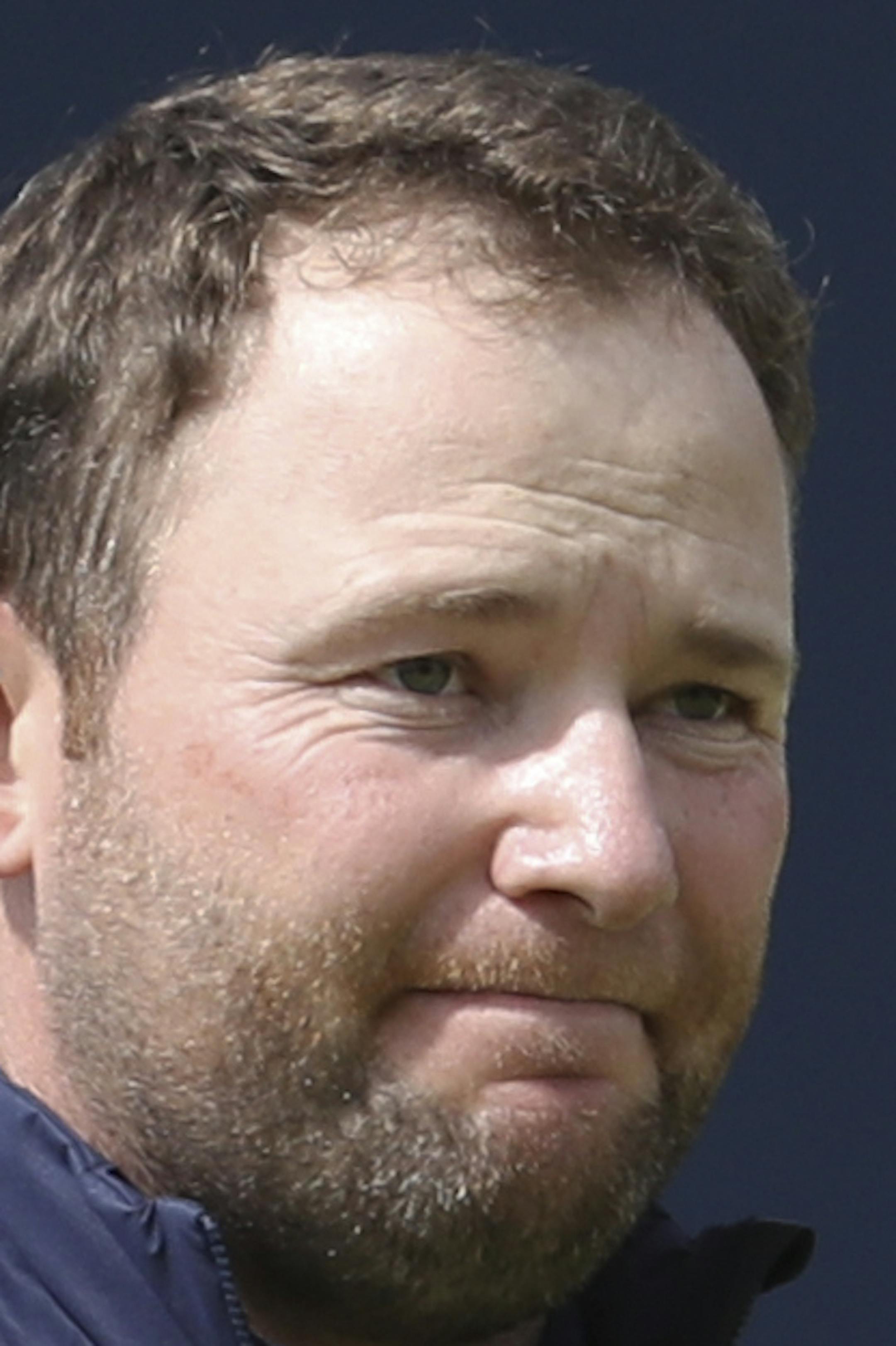South Africa's Branden Grace leaves the 18th green after the third round of the British Open Golf Championship, at Royal Birkdale, Southport, England, Saturday July 22, 2017. (AP Photo/Peter Morrison)