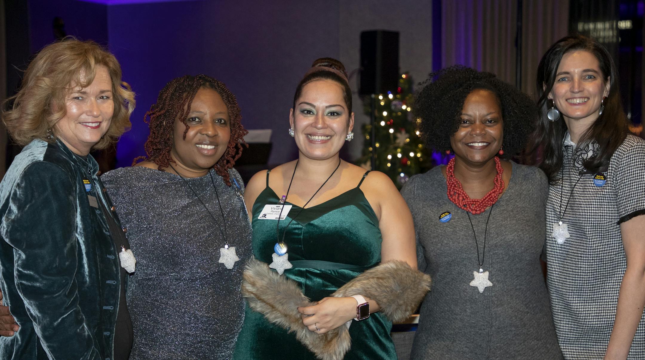 Patricia McArdle, Umo Udo, Viviana Ramos, KaTina Cummings, Wendy Underwood at the 2019 Saint Nicholas Dinner. [ Special to Star Tribune, photo by Matt Blewett, Matte B Photography, matt@mattebphoto.com, Saint Nicholas Dinner, Catholic Charities, Dec. 5, 2019, Minnesota, 1009874409 FACE122219