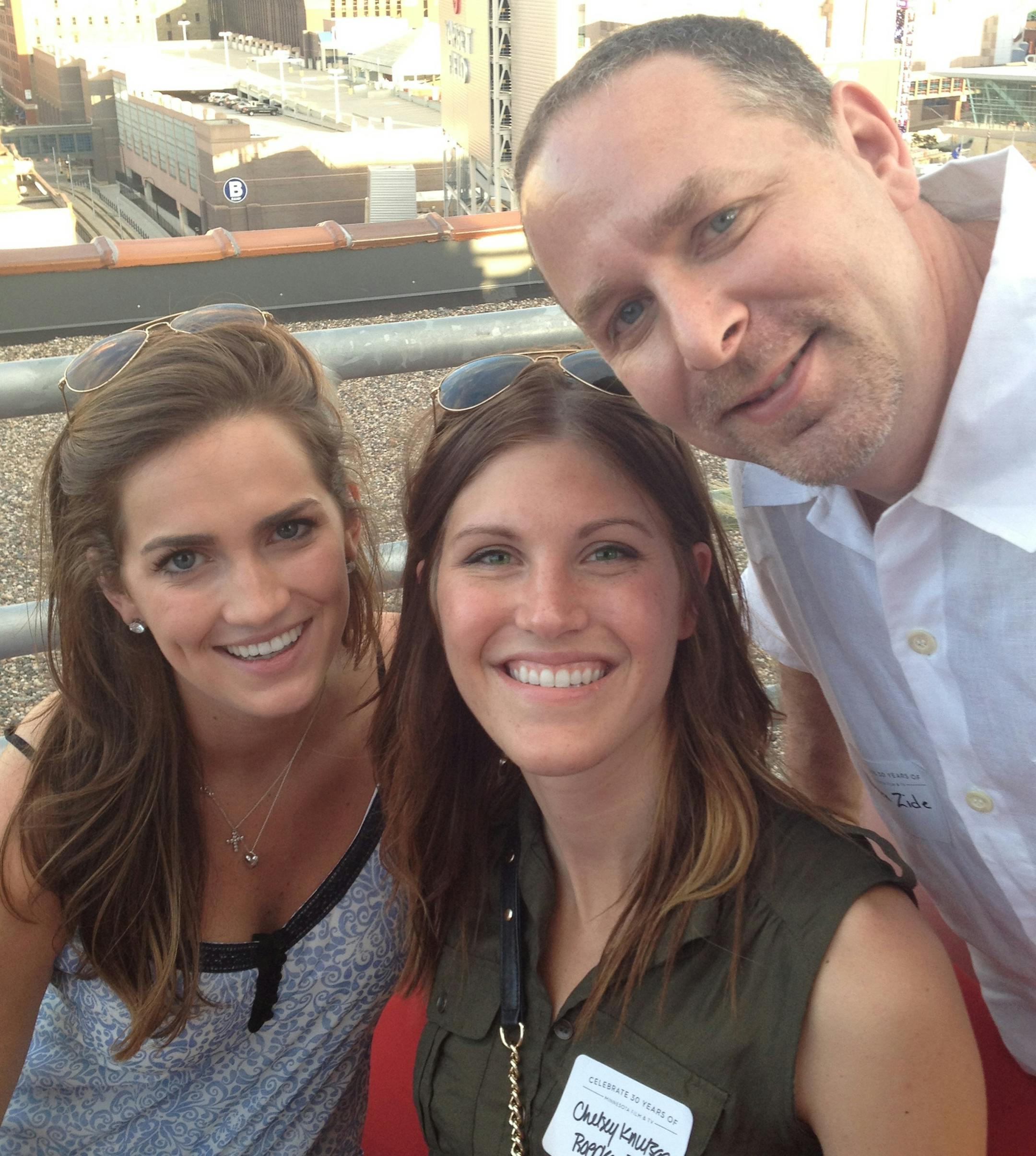 Kelsey Shea and Chelsey Knutson of Roepke Public Relations, organizers of the event, with director Warren Zide.