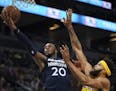 Timberwolves guard Josh Okogie took a first-quarter shot as Lakers center JaVale McGee defended in Minnesota's 124-120 victory at Target Center on Mon