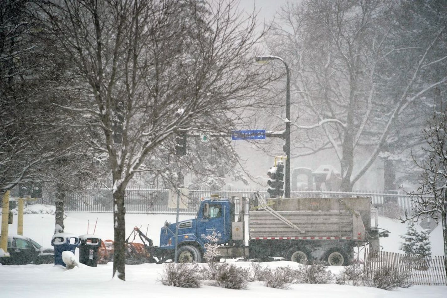 A snowplow helped clear the roads near Bde Maka Ska in Minneapolis on Sunday morning, Feb. 9, 2020.