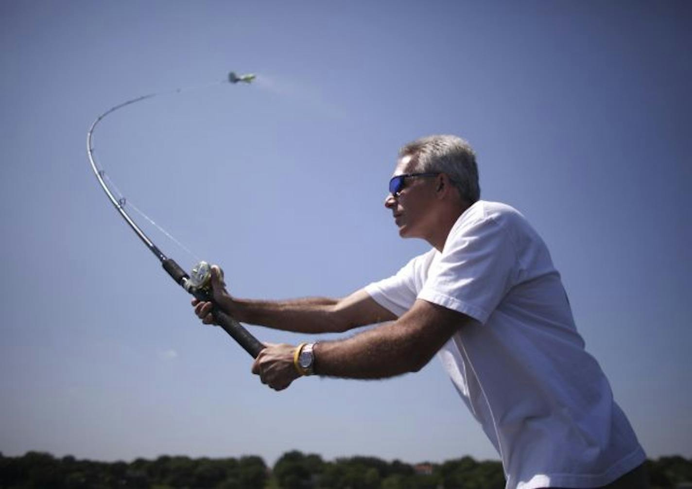 Bob Turgeon demonstrated his big lure casting technique on the water at Lake Minnetonka Thursday afternoon.