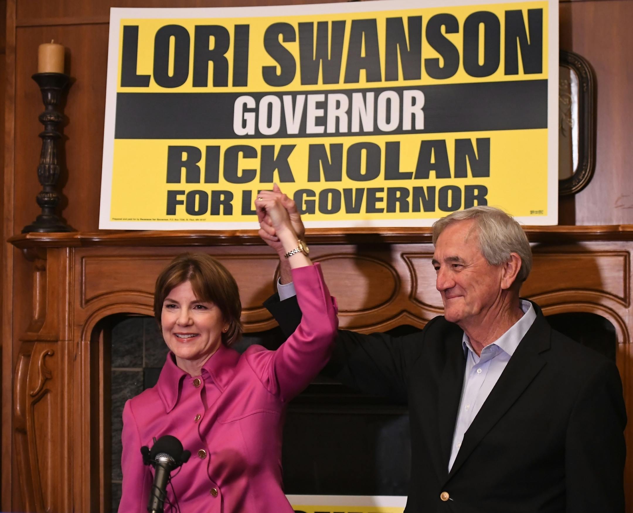 Gubernatorial candidate Lori Swanson held running mate Rep. Rick Nolans hand at the conclusion of Swanson's concession speech Tuesday night at Jax Cafe in Minneapolis.