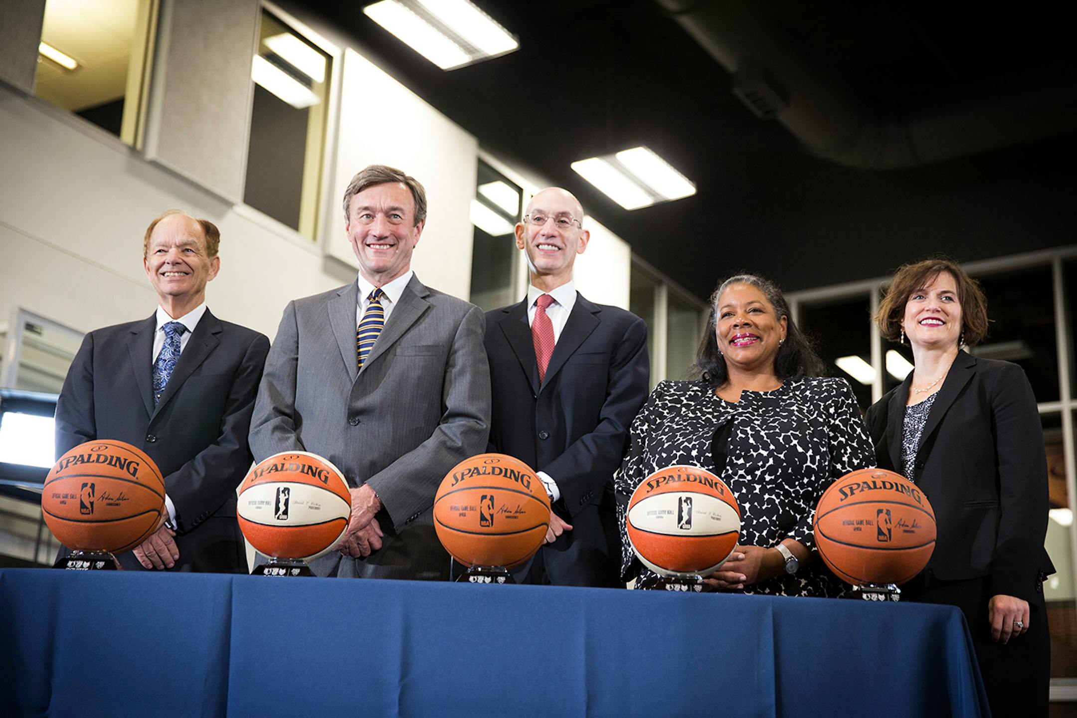 Timberwolves and Lynx owner, Glen Taylor, from left, poses for a photo with Mayo Clinic President and CEO Dr. John Noseworthy, NBA Commissioner Adam Silver, WNBA President Laurel Richie and Minneapolis Mayor Betsy Hodges during a grand opening event at the Timberwolves and Lynx Courts at Mayo Clinic Square in downtown Minneapolis on Wednesday, June 17, 2015.