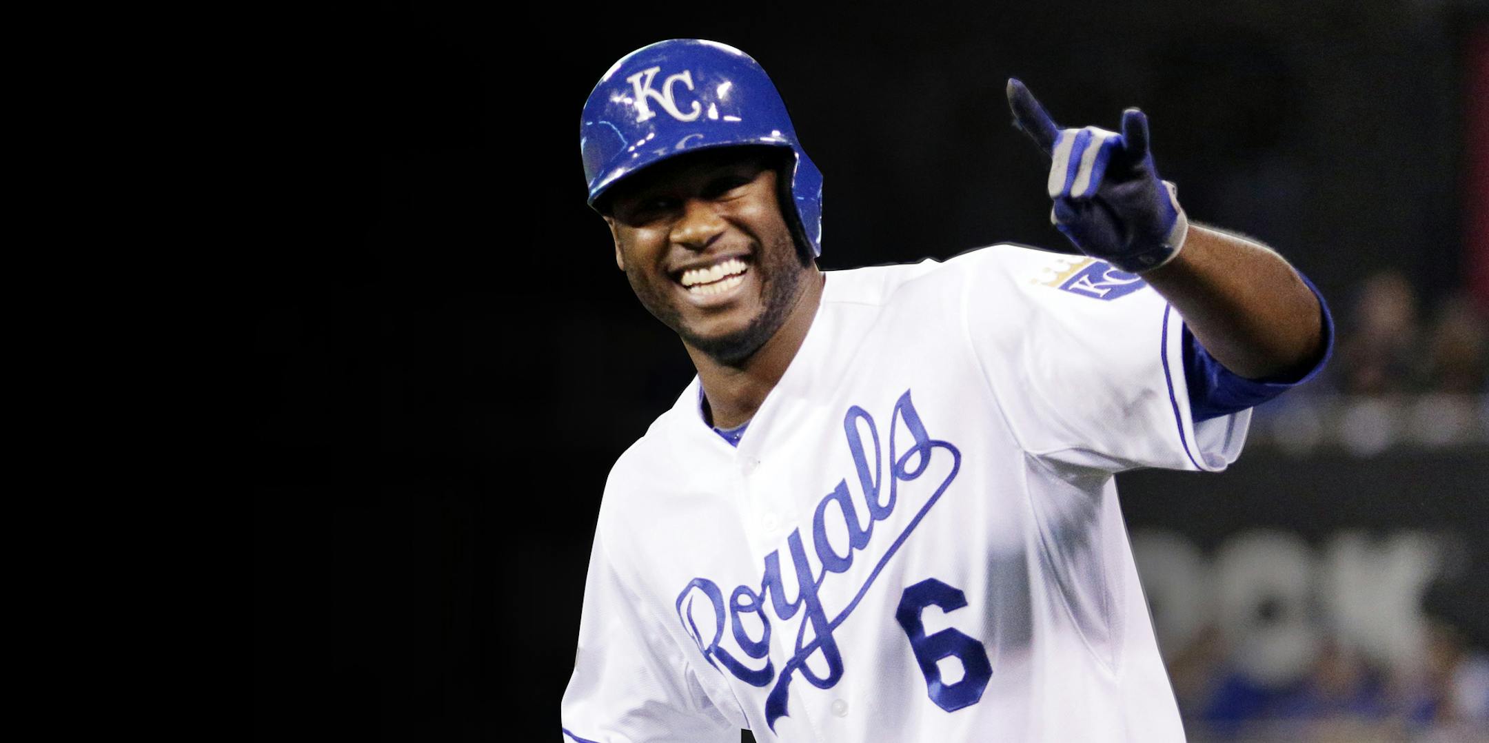 Kansas City Royals' Lorenzo Cain celebrates a single against the Toronto Blue Jays during the third inning in Game 6 of baseball's American League Championship Series on Friday, Oct. 23, 2015, in Kansas City, Mo. (AP Photo/Charlie Riedel) ORG XMIT: ALCS148