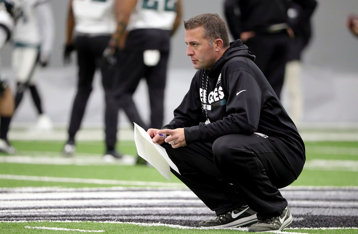 In this Jan. 3, 2018, photo, John DeFilippo watches the Eagles practice in Philadelphia. The Vikings hired DeFilippo as their offensive coordinator earlier this month.