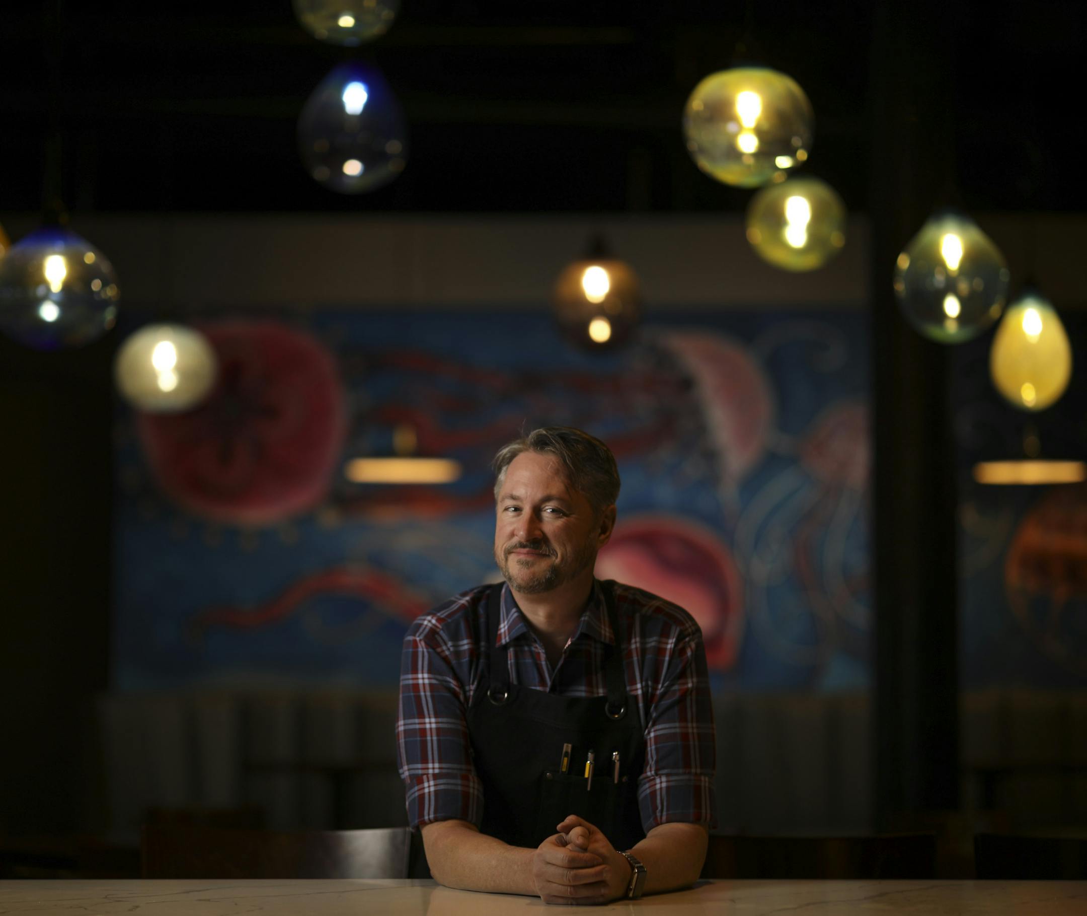 Chef Tim McKee at the bar in the dining room of his Octo Fishbar in St. Paul's Lowertown. ] JEFF WHEELER &#xef; jeff.wheeler@startribune.com Chef Tim McKee opened a new restaurant, Octo Fishbar in St. Paul's Lowertown this year. He was photographed in the dining room of the new concept Wednesday afternoon, December 13, 2017.