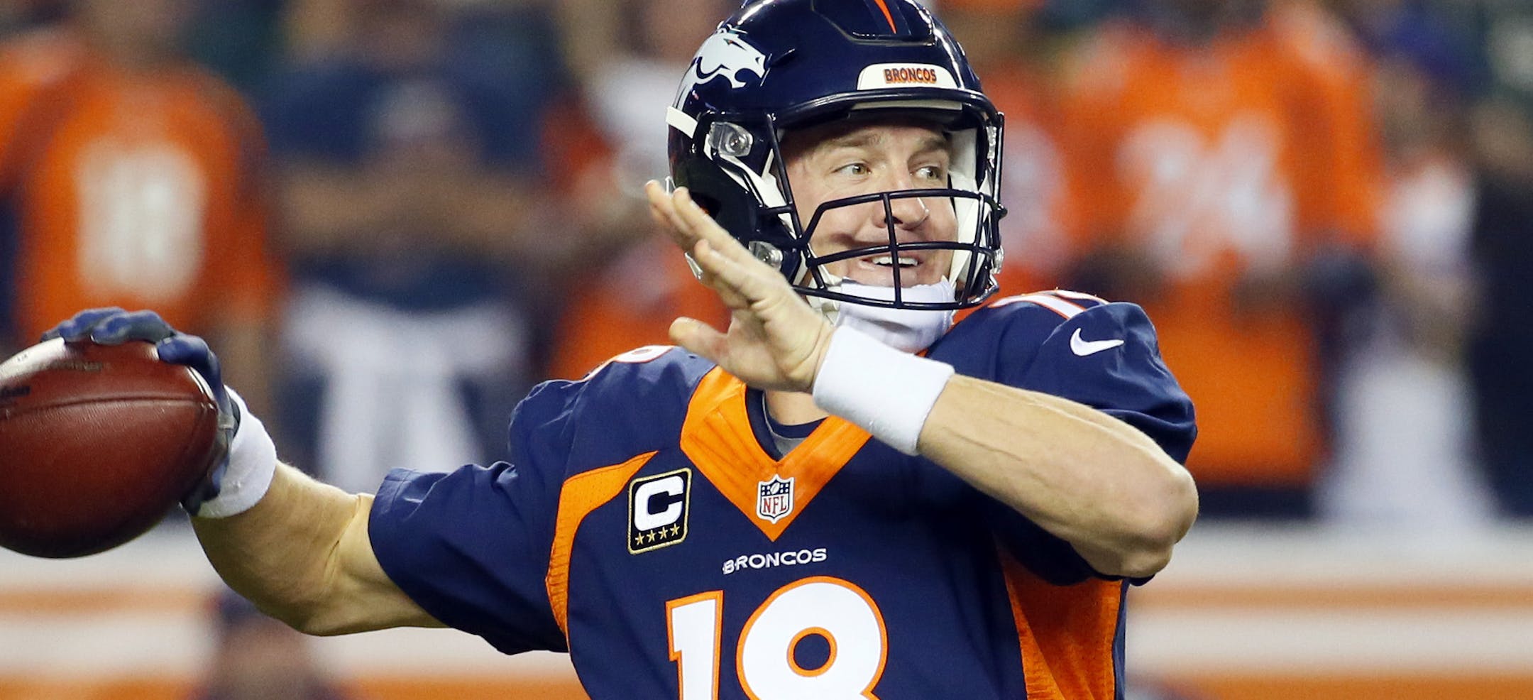 Denver Broncos quarterback Peyton Manning (18) throws against the Green Bay Packers during the first half of an NFL football game, Sunday, Nov. 1, 2015, in Denver. (AP Photo/Jack Dempsey)