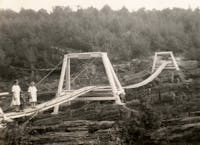 The first bridge was built in 1924. It is shown in an image from the Karen Bromen family.