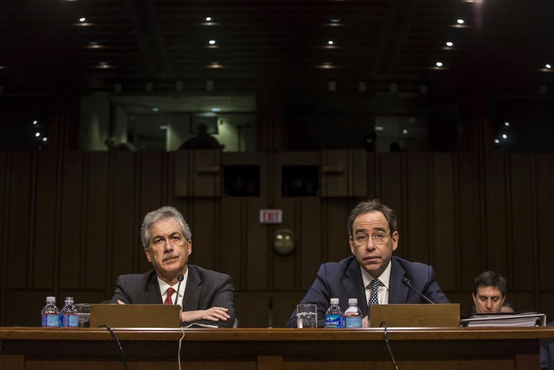 Deputy Secretary of State William Burns, left, and Deputy Secretary of State for Management and Resources Thomas Nides were sharply questioned at a hearing of the Senate Foreign Relations Committee.
