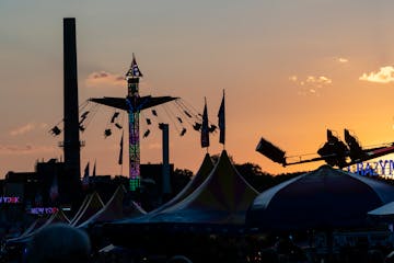 The Mighty Midway, featuring amusement park rides, is a popular area at the Minnesota State Fair. One person was shot in the leg late Saturday near th