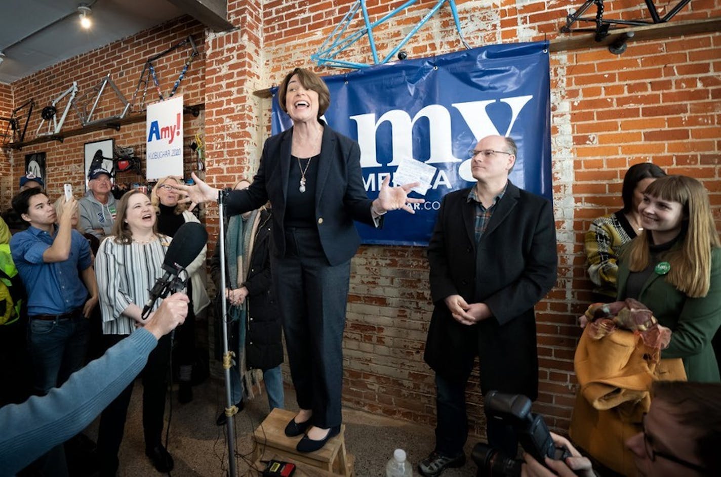 Joined by daughter Abigail and husband John, Sen. Amy Klobuchar made her first campaign appearance as a presidential candidate Saturday in Eau Claire, Wis.