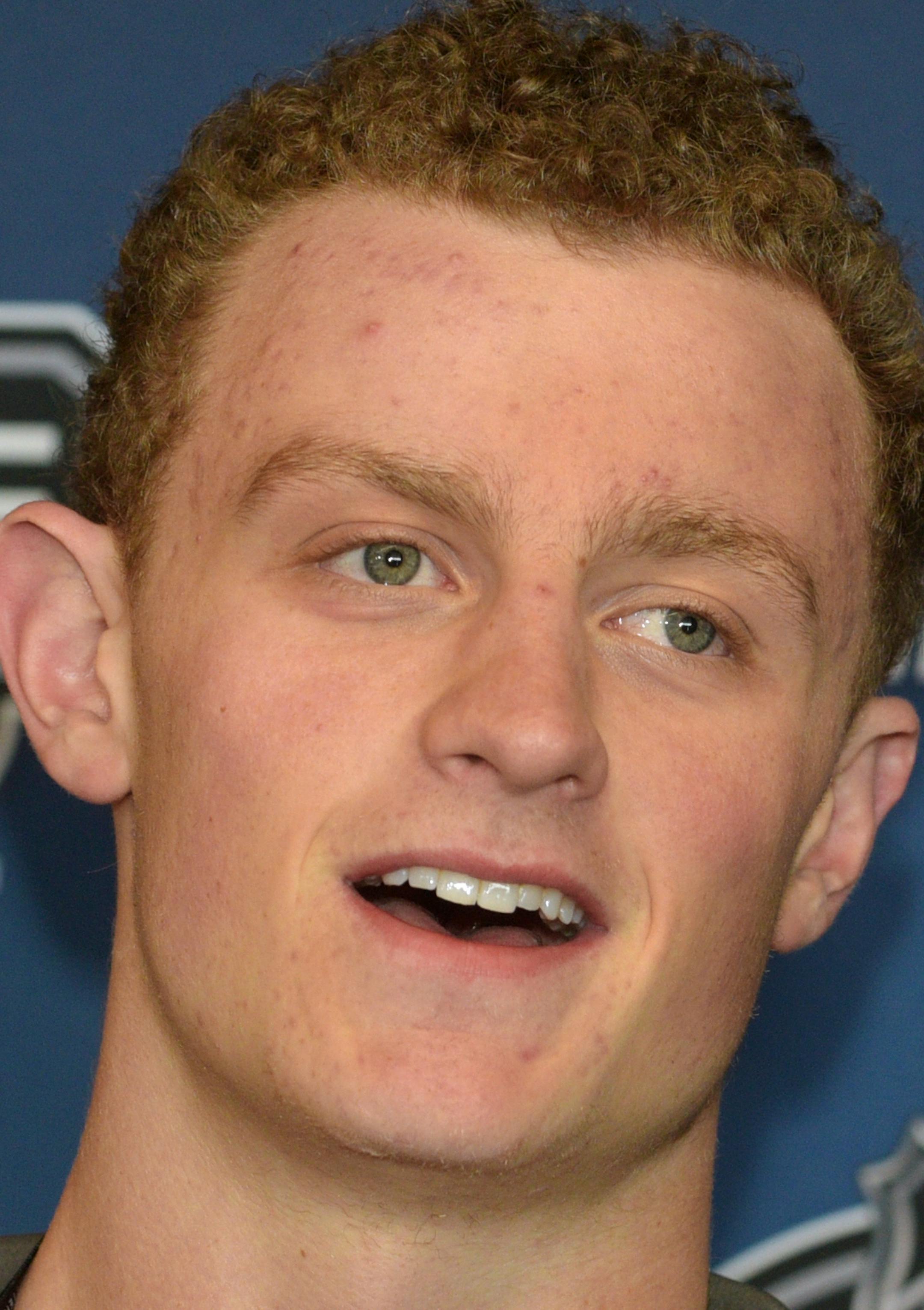 Jack Eichel reacts to a question at a hockey news conference during the NHL Combine, Friday, June 5, 2015, in Buffalo, N.Y. (AP Photo/Gary Wiepert) ORG XMIT: MIN2015062518234073