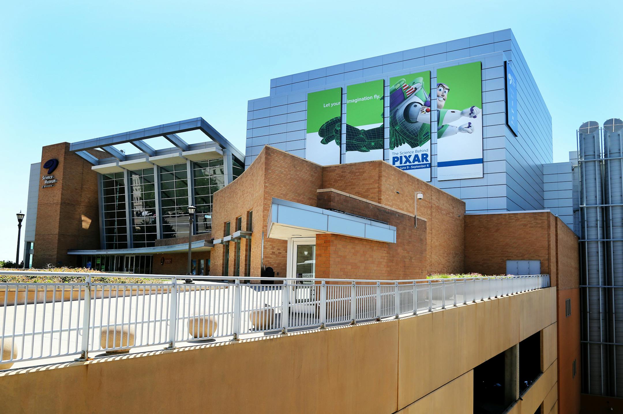 Giant panels of Buzz Lightyear from Toy Story fame announces the Science Behind Pixar exhibit that's opening Friday, June 9 at the Science Museum of Minnesota and seen Thursday, June 1, 2017, in St. Paul, MN.] DAVID JOLES ï david.joles@startribune.com Science Behind Pixar exhibit that's opening at the Science Museum of Minnesota ORG XMIT: MIN1706011514341786