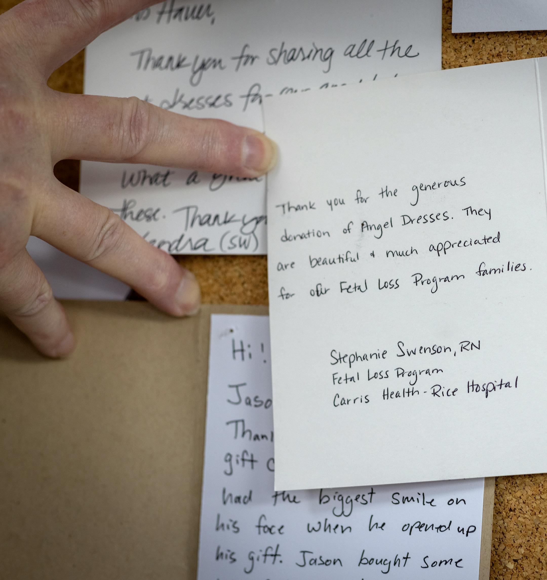 Patty Hauer's displays thank you notes for "Angel Dresses"  in the All Saints Lutheran Church basement in  Darwin, Minn.