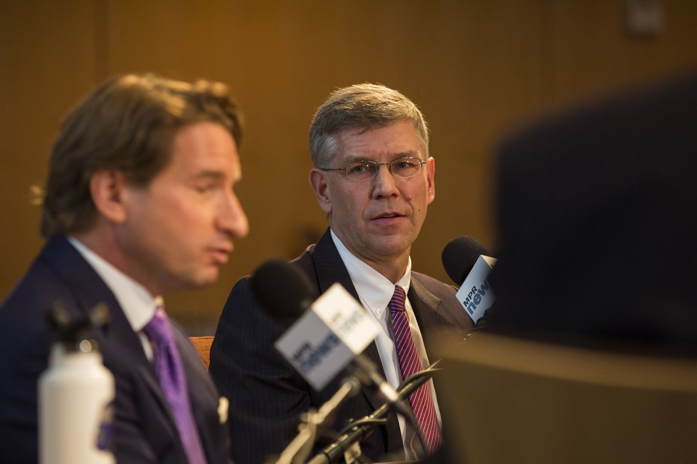 GOP Rep. Erik Paulsen listens to DFL candidate Dean Phillips at their debate at the UBS Forum at Minnesota Public Radio in St. Paul on Friday, Oct. 5, 2018. (Tony Saunders/Minnesota Public Radio via AP)