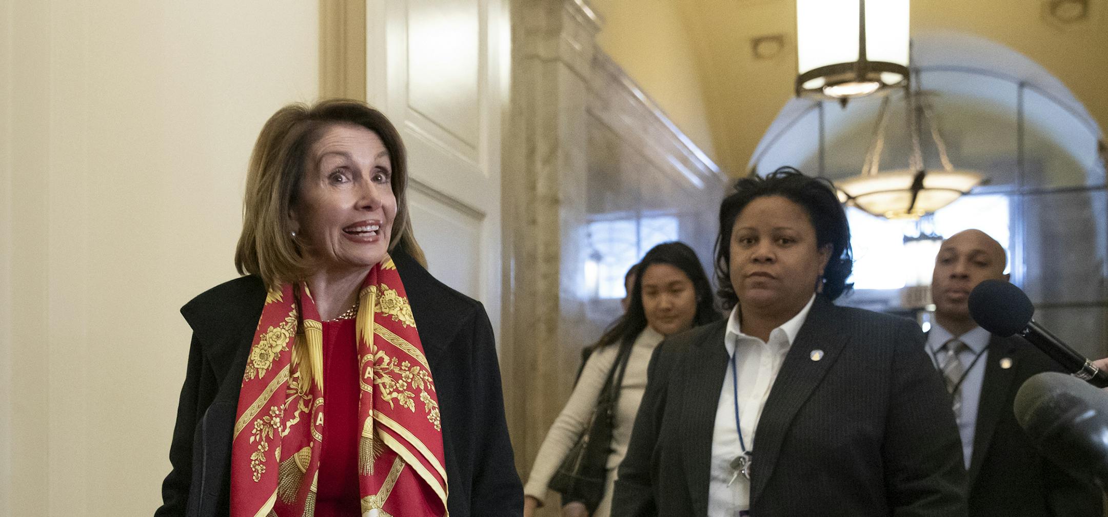 Speaker of the House Nancy Pelosi, D-Calif., responds to reporters after officially postponing President Donald Trump's State of the Union address until the government is fully reopened, at the Capitol in Washington, Wednesday, Jan. 23, 2019. The California Democrat told Trump in a letter Wednesday the Democratic-controlled House won't pass the required measure for him to give the nationally televised speech from the House floor. (AP Photo/J. Scott Applewhite)
