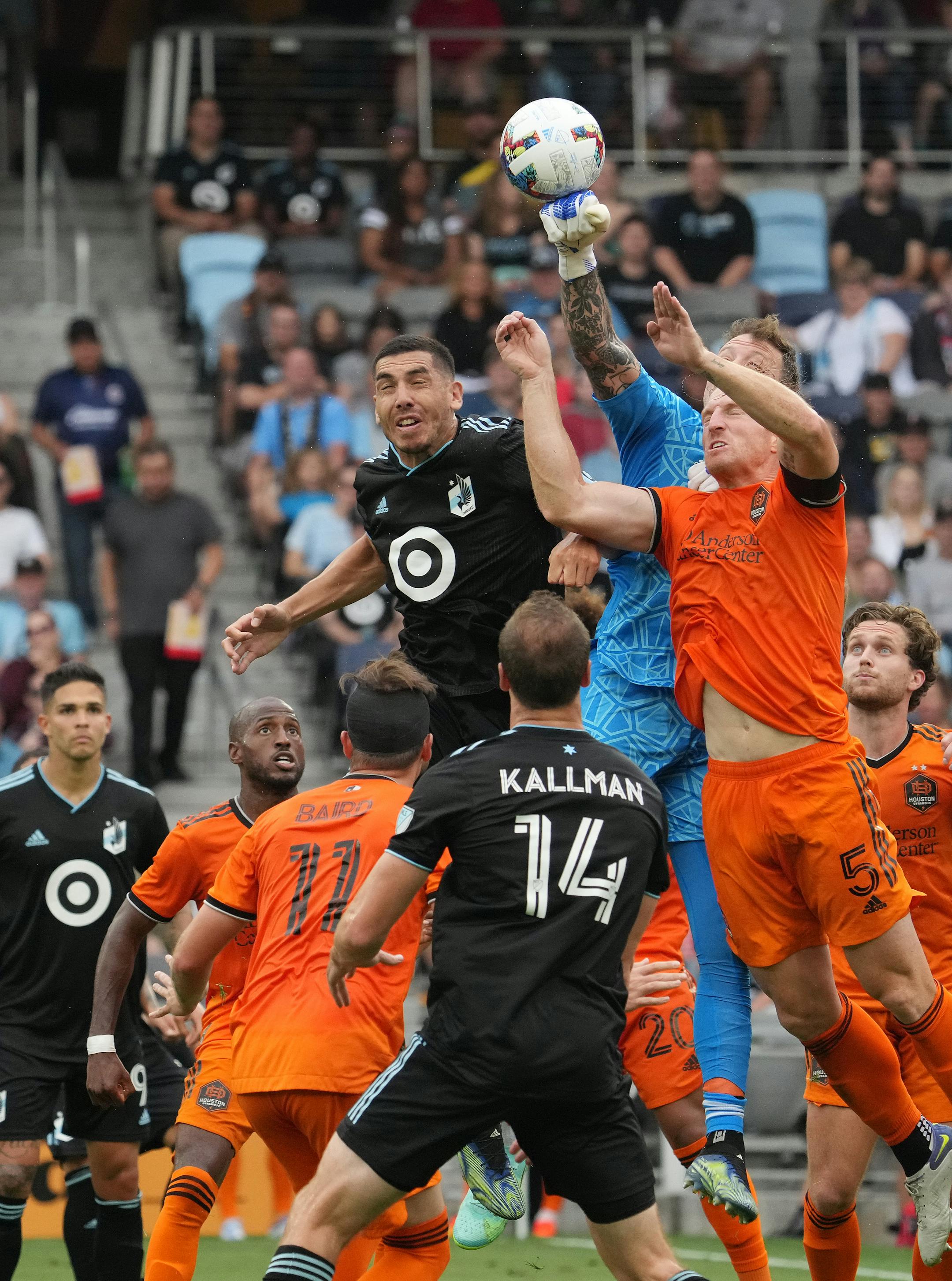 Houston Dynamo goalkeeper Steve Clark (12) gets his fist on the ball to clear a corner kick in the first half of an MLS game between Minnesota United and the Houston Dynamo.