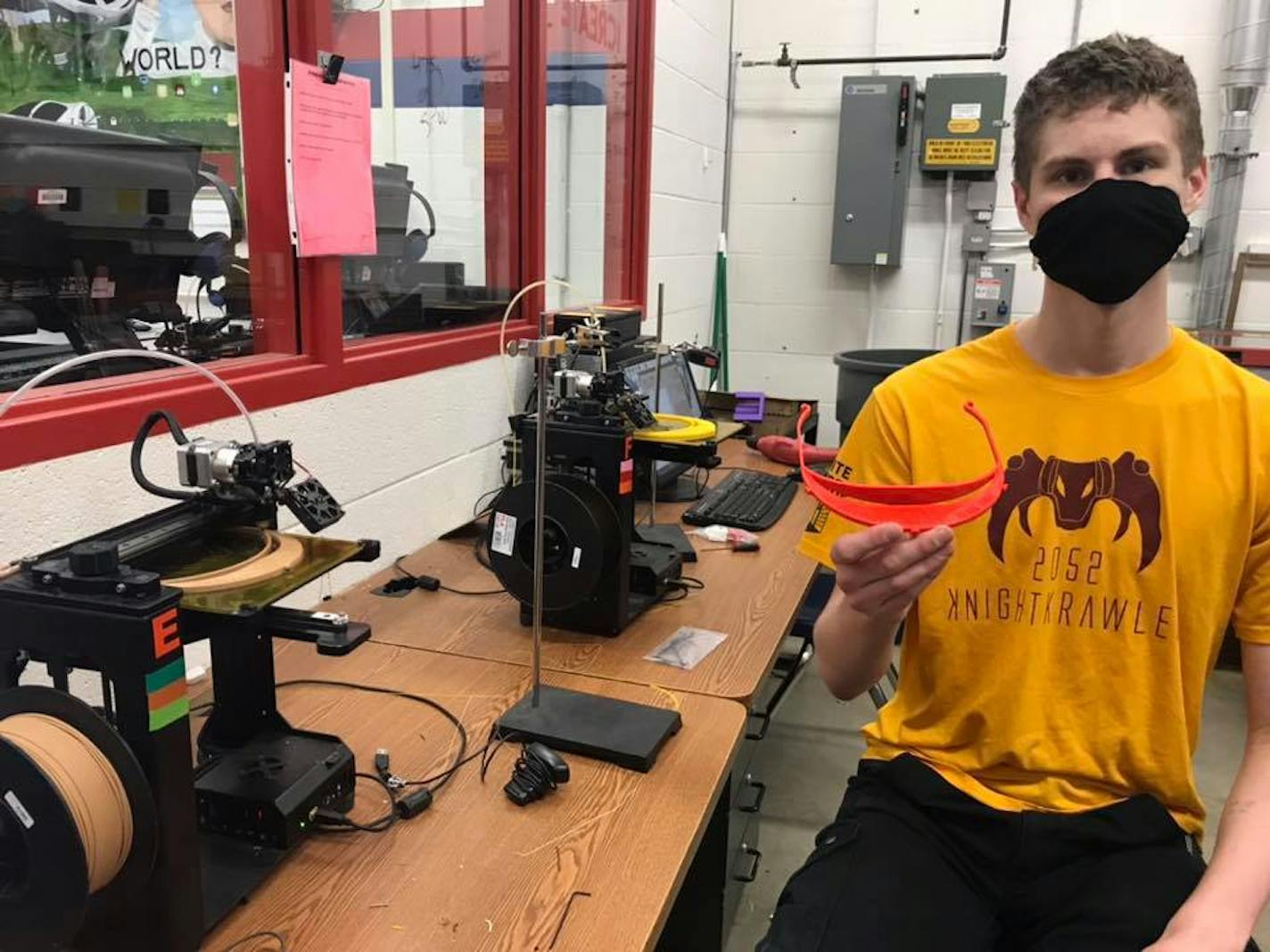 A KnightKrawler robotics team meber from Irondale High School in Mounds View at work making face shield visors with a 3-D printer. ORG XMIT: 8f4K1BYp88NxzsUWUO4q