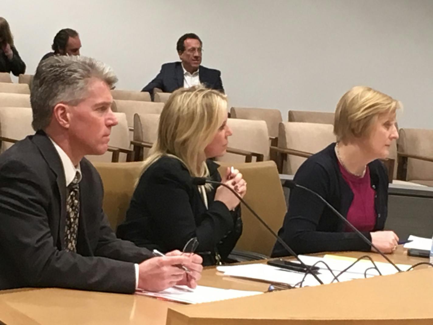 Minnesota state Sen. Karin Housley (center) is flanked by senior care lobbyists Toby Pearson (left), with Care Providers of Minnesota, and Kari Thurlow (right), with LeadingAge Minnesota, at a recent Senate committee hearing on elder abuse legislation.