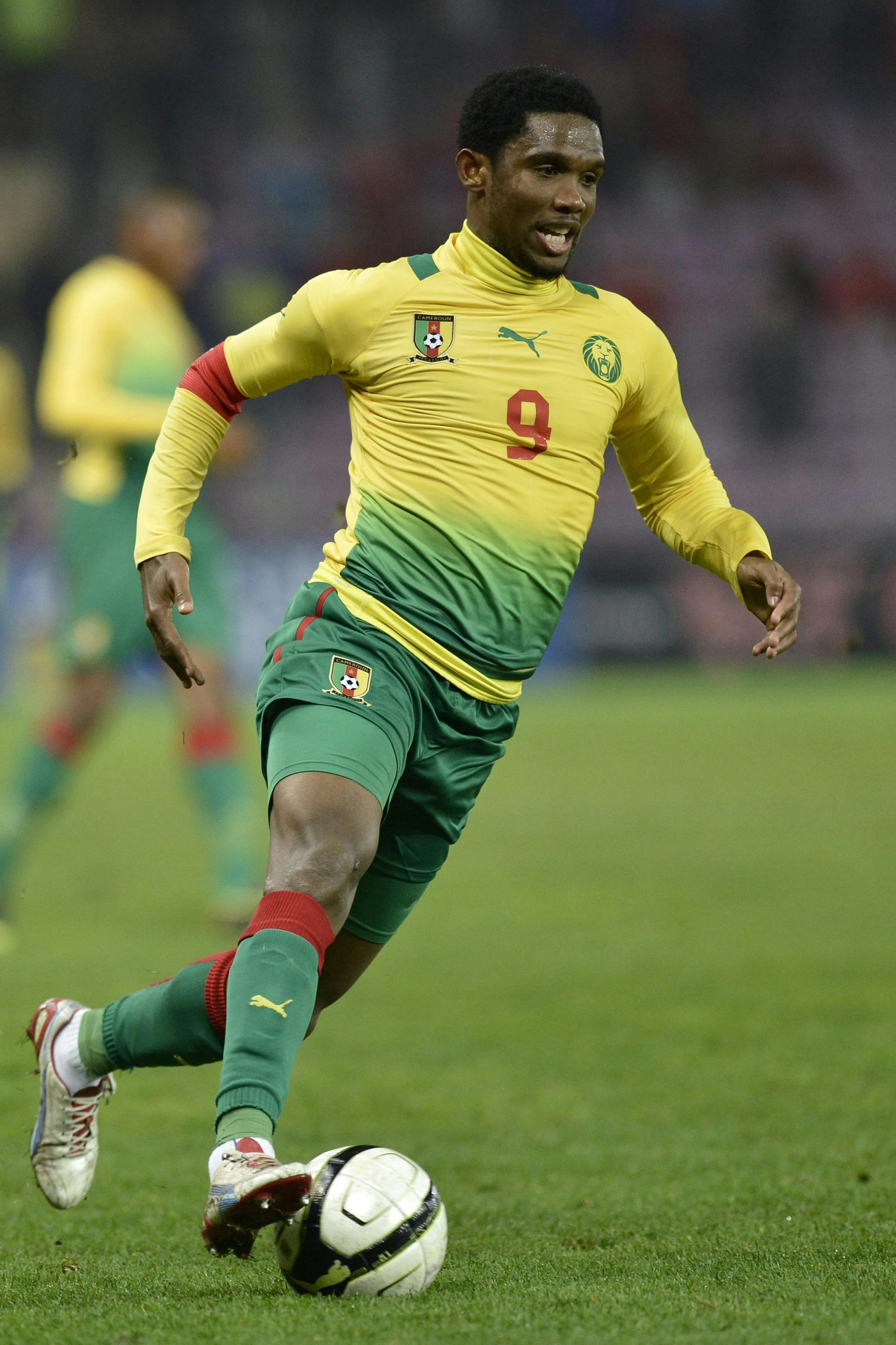 FILE- In this Nov. 14, 2012, file photo, Cameroon's player Samuel Eto'o controls the ball during a friendly soccer match between Albania and Cameroon, at the Stade de Geneve stadium, in Geneva, Switzerland. (AP Photo/Keystone, Martial Trezzini, file) - SEE FURTHER WORLD CUP CONTENT AT APIMAGES.COM
