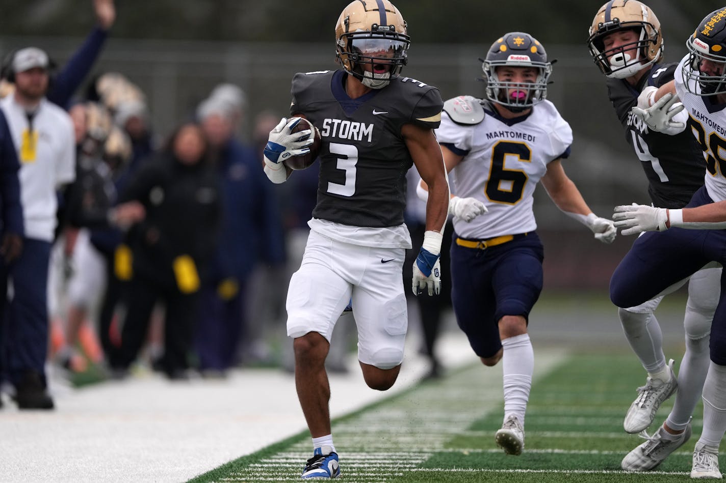 Chanhassen running back Maxwell Woods (3) returns a kickoff for a touchdown in the first quarter of a MSHSL Class 5A state quarterfinal game between Chanhassen and Mahtomedi Saturday, Nov. 11, 2023 at Apple Valley High School in Apple Valley, Minn. ] ANTHONY SOUFFLE • anthony.souffle@startribune.com