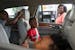 Jessica Loveless pumped gas into her vehicle while her sons Zyaire, 5, Zion, 7, and Zakari, 1 left to right, waited Wednesday at a Speedway gas statio