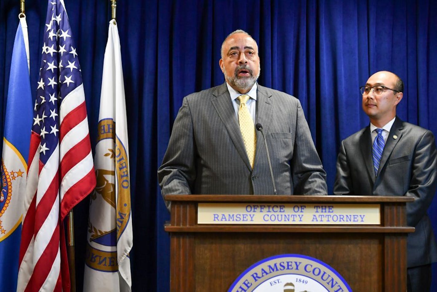 Don Lewis speaks Friday after Ramsey County Attorney John Choi, right, named him as a special prosecutor in the inquiry into the death of Philando Castile.