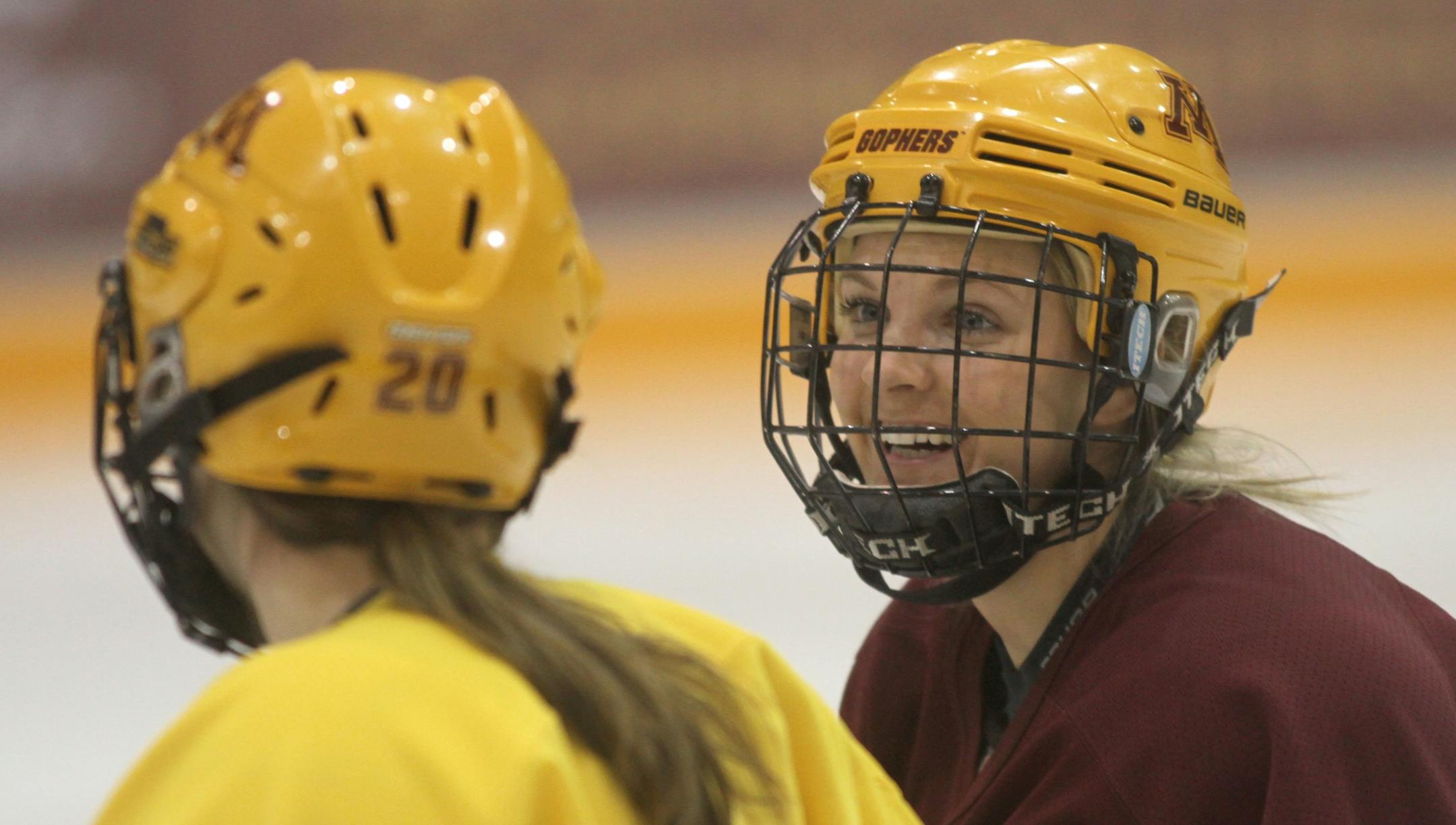 (left to right) Gophers Meghan Lorence and Amanda Kessel talked during practice on 1/30/13 at the Ridder Center.
