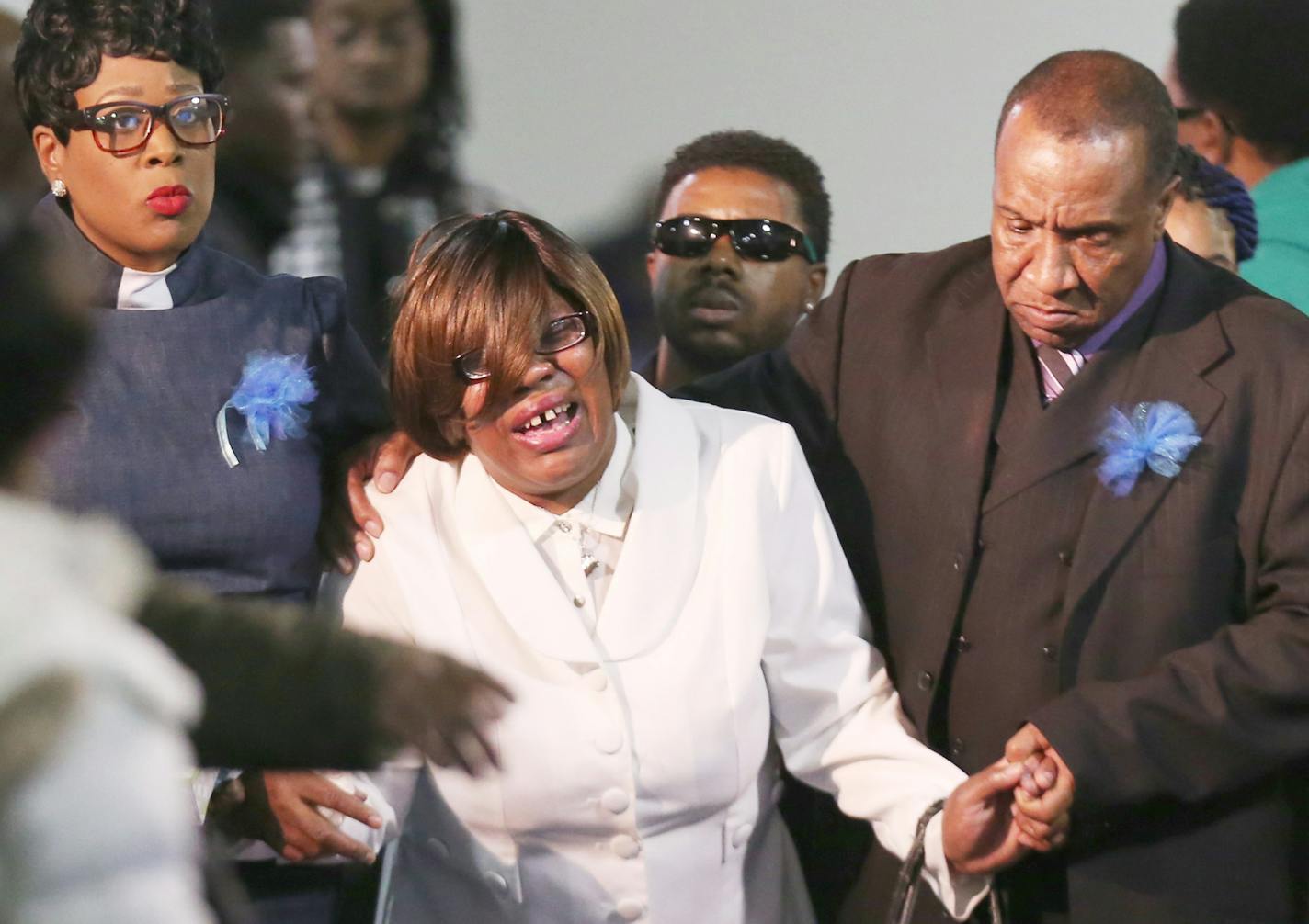 Irma Burns mother of Jamar Clark was escorted from her sons casket durnig funeral services at Shiloh Temple International Ministries Wednesday November 25, 2015 in Minneapolis, MN.] Visitation and funeral services for Jamar Clark were held at Shiloh Temple International Ministries in North Minneapolis. Jerry Holt/ Jerry.Holt@Startribune.com