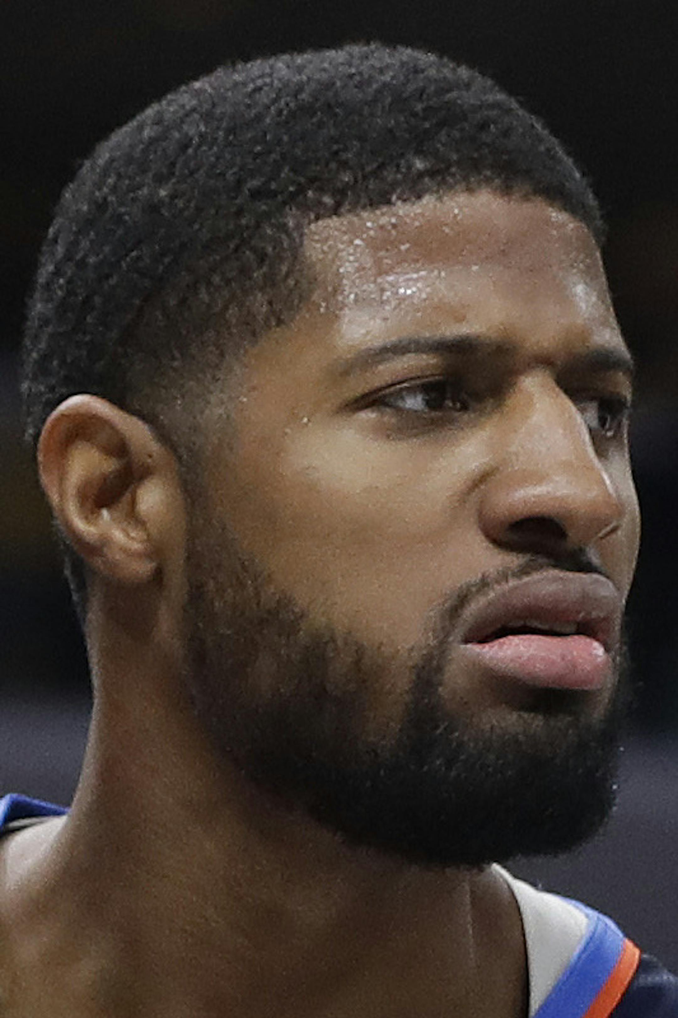 Oklahoma City Thunder's Paul George reacts after a dunk during the first half of an NBA basketball game against the Indiana Pacers, Thursday, March 14, 2019, in Indianapolis. (AP Photo/Darron Cummings) ORG XMIT: INDC103