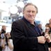 FILE - Actor Gerard Depardieu poses for photographers during a photo call for the film Valley of Love, at the 68th international film festival, Cannes