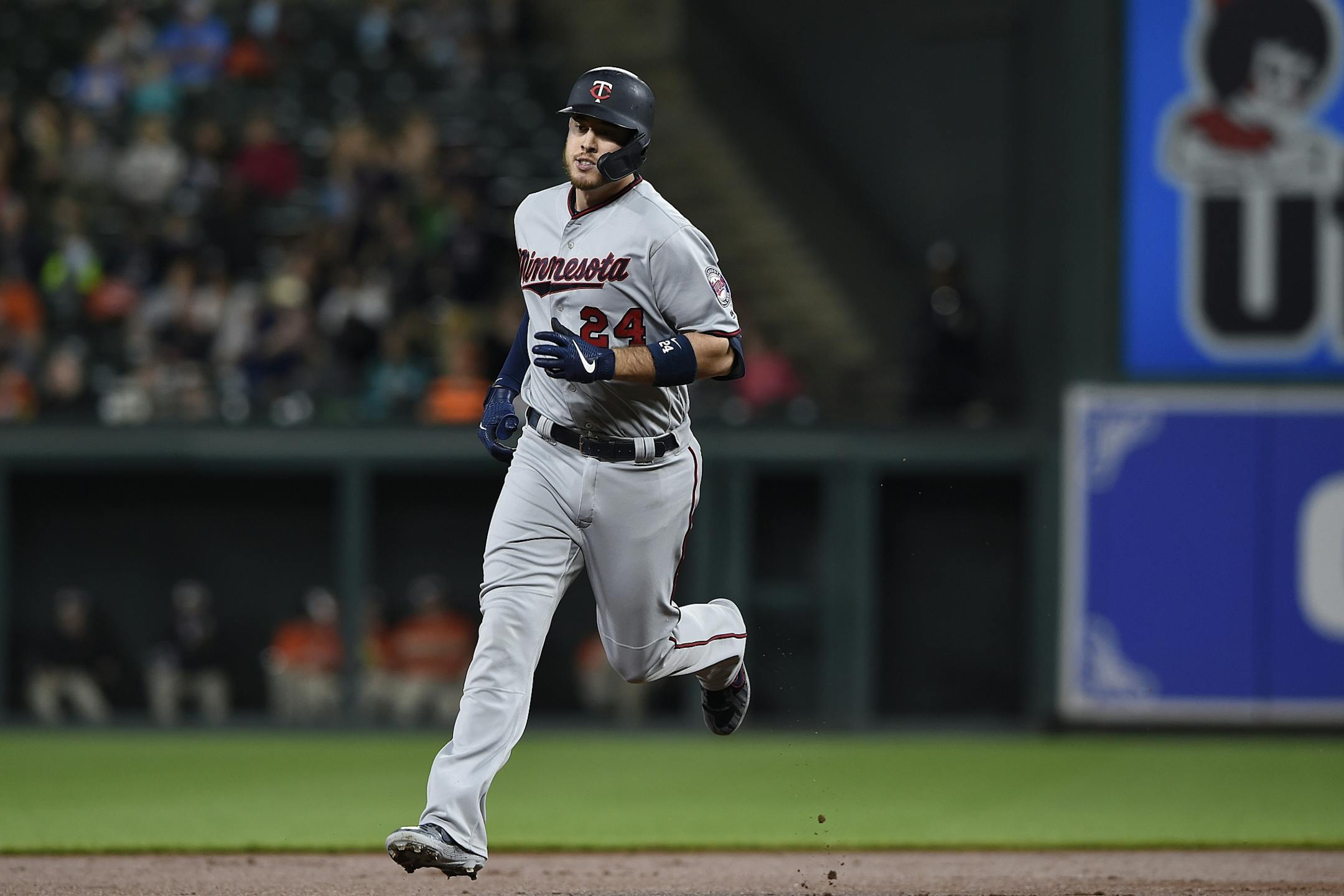 Minnesota Twins C.J. Cron rounds second base after hitting a solo home run against the Baltimore Orioles in the first inning of the second game of a baseball doubleheader, Saturday, April 20, 2019, in Baltimore.