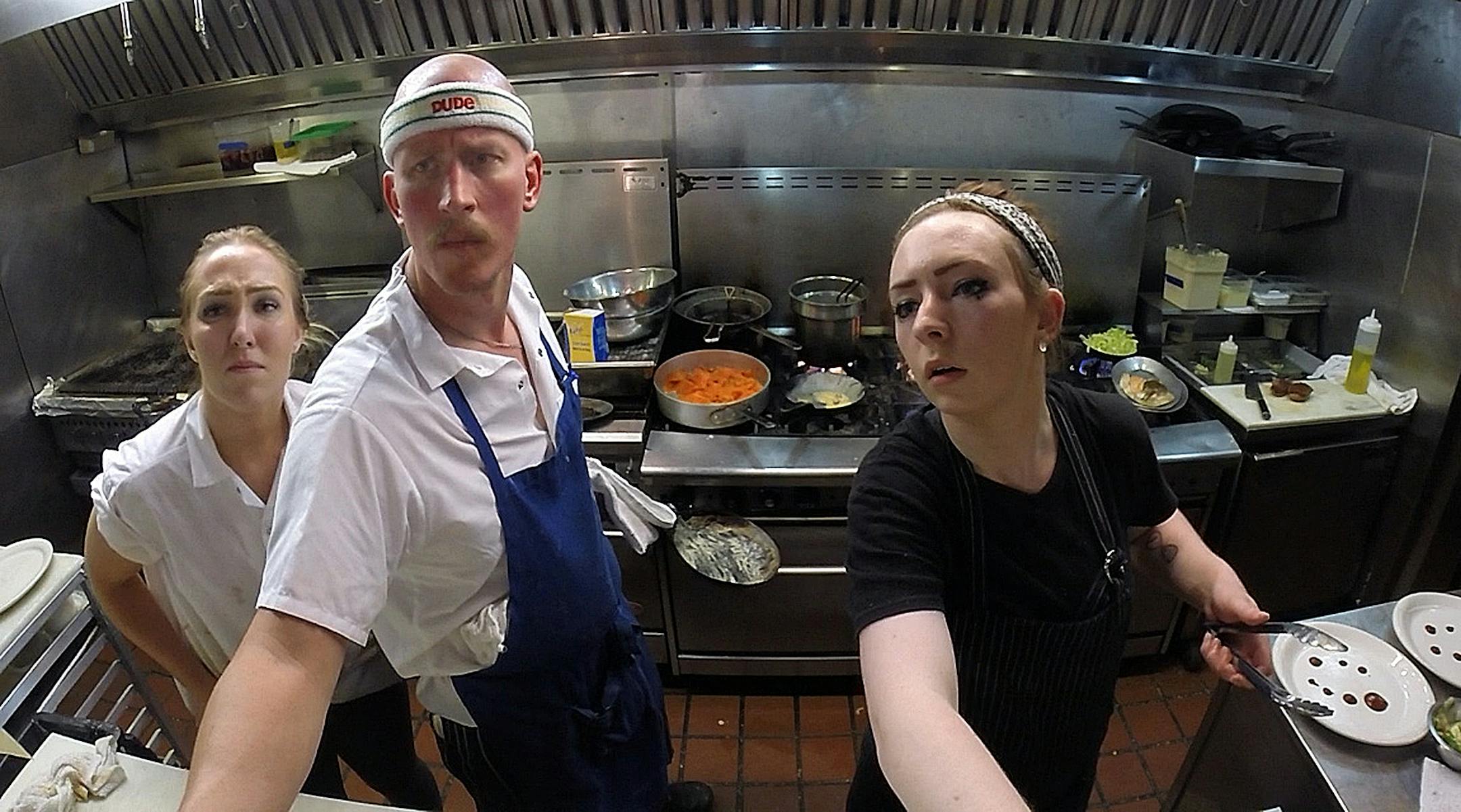 Chefs Tom Roberts, Kodi Satra (white top) and Kenzie Edinger (black top) spent a busy Saturday night preparing meals for patrons at The Strip Club Meat & Fish Restaurant in St. Paul. ] JIM GEHRZ ï james.gehrz@startribune.com / Minneapolis, MN / June 20, 2015 / 7:00 PM ñ BACKGROUND INFORMATION: FOR SATURDAY NIGHT PROJECT - a) Three chefs at The Strip Club Meat & Fish Restaurant in St. Paul spent a busy Saturday night preparing meals for patrons. The chefs are: Tom Roberts, Kodi Satra (w